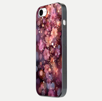 Glowing Petal Bliss Glass Case for iPhone 16e side-angle image showing light reflection and soft floral texture