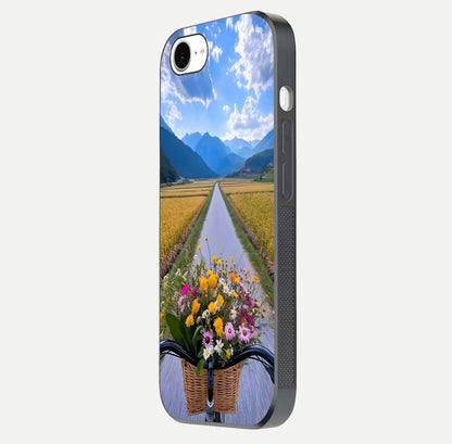 Golden Field Journey Glass Case for iPhone 16e side-angle image showing golden glow, reflection shine, and curved edge