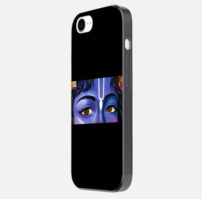 Krishna Eye Glass Case for iPhone 16e side-angle image showing reflection clarity and Krishna symbol design