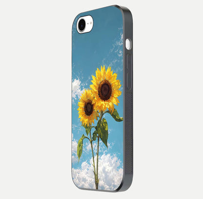 Sunflower Sky Bloom Glass Case for iPhone 16e side-angle image showing reflection, edges, and sunflower color