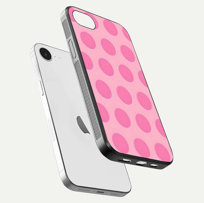 Sweet Dot Dreams iPhone 16e glass phone case floating view emphasizing glossy surface and soft playful styling