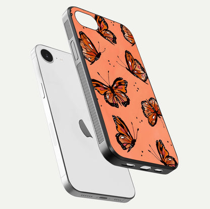 Coral Wing Butterfly Glass Case for iPhone 16e floating mockup showing HD gloss texture and vivid coral color