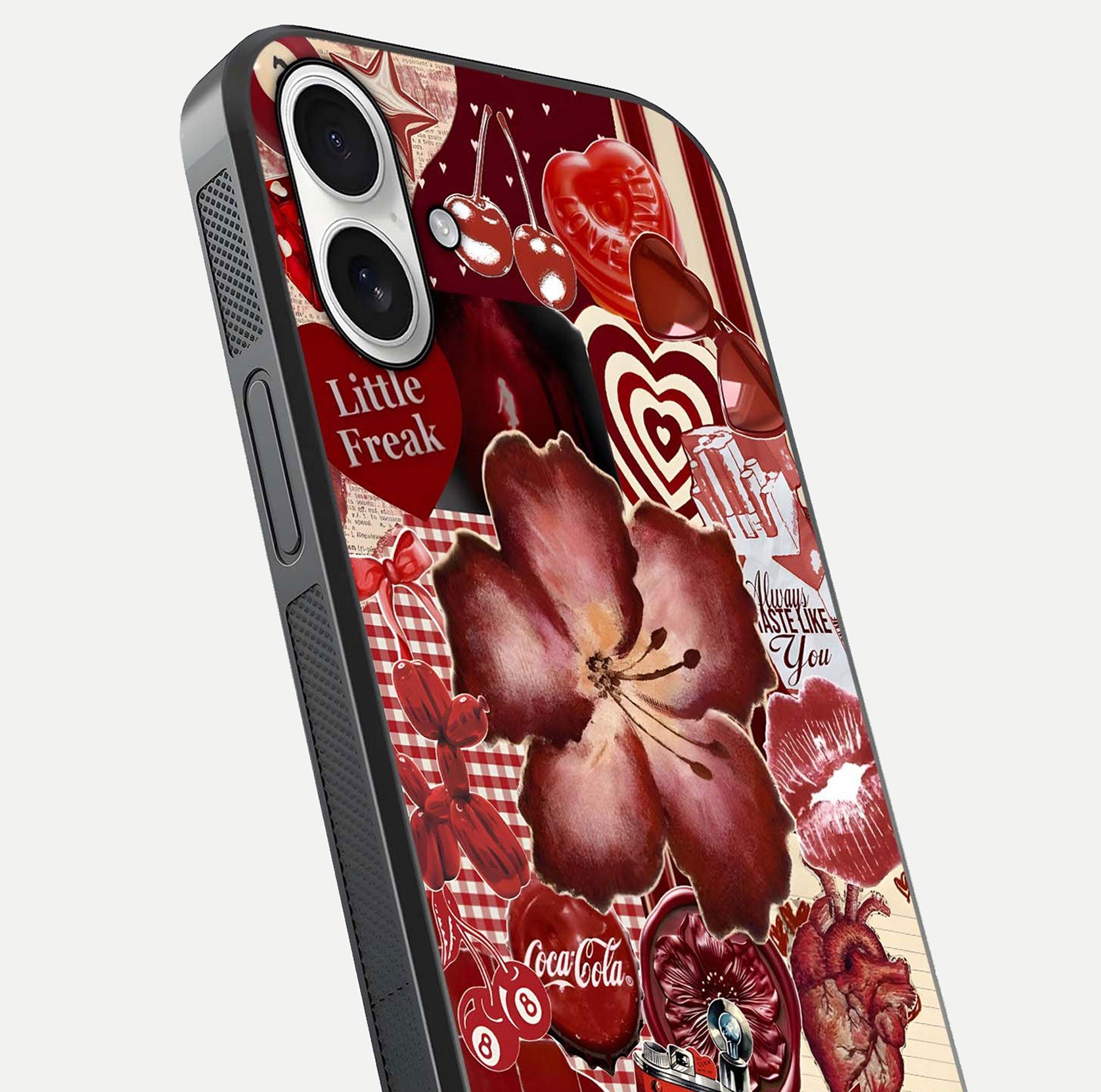 Aesthetic Little Freak Glass Case for iPhone 17 close-up angled shot showing detailed artwork, bold design, and gloss reflection