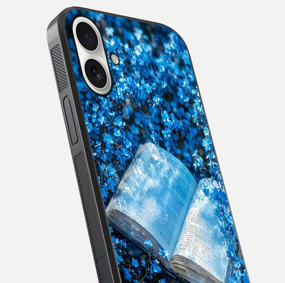Blue Bloom Tales Glass Case for iPhone 17 close-up angle showing petal texture and blue tone reflection