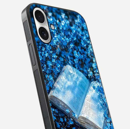 Blue Bloom Tales Glass Case for iPhone 17 close-up angle showing petal texture and blue tone reflection