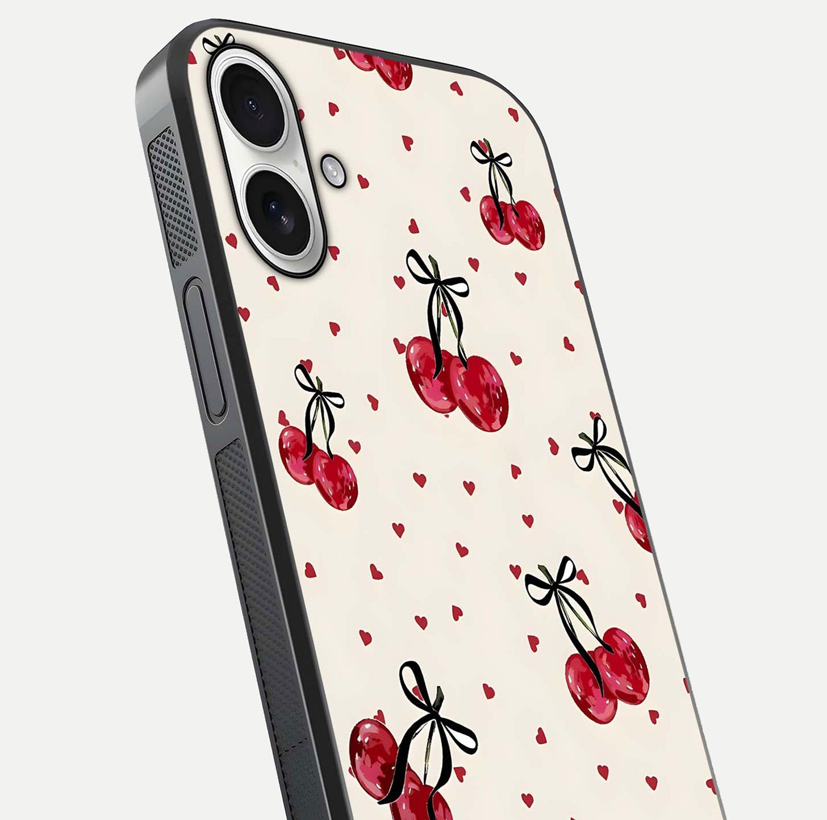 Cherry Heart Bow Glass Case for iPhone 17 close-up highlighting small bows, cherry red tones, and gloss shine