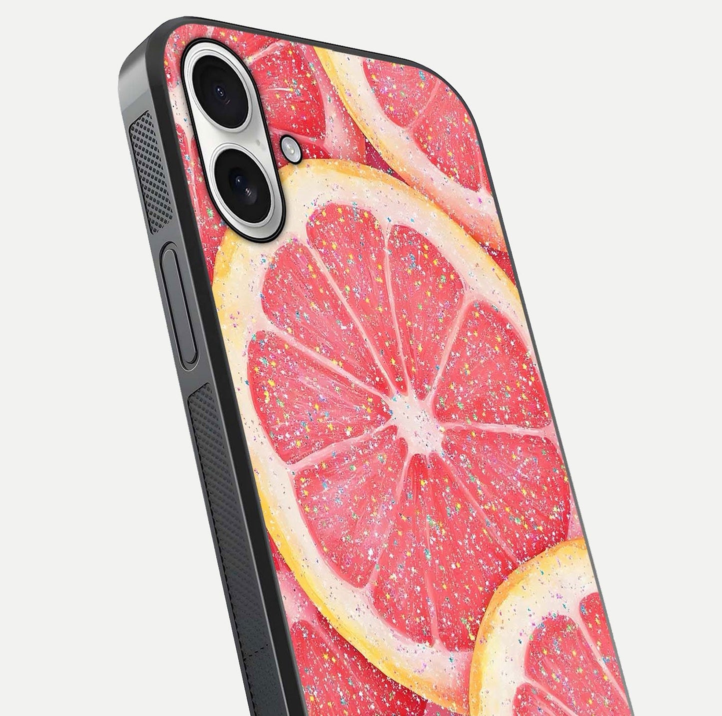 Glitter Grapefruit Glass Case for iPhone 17 close-up angled shot showing fruit texture and glitter reflection