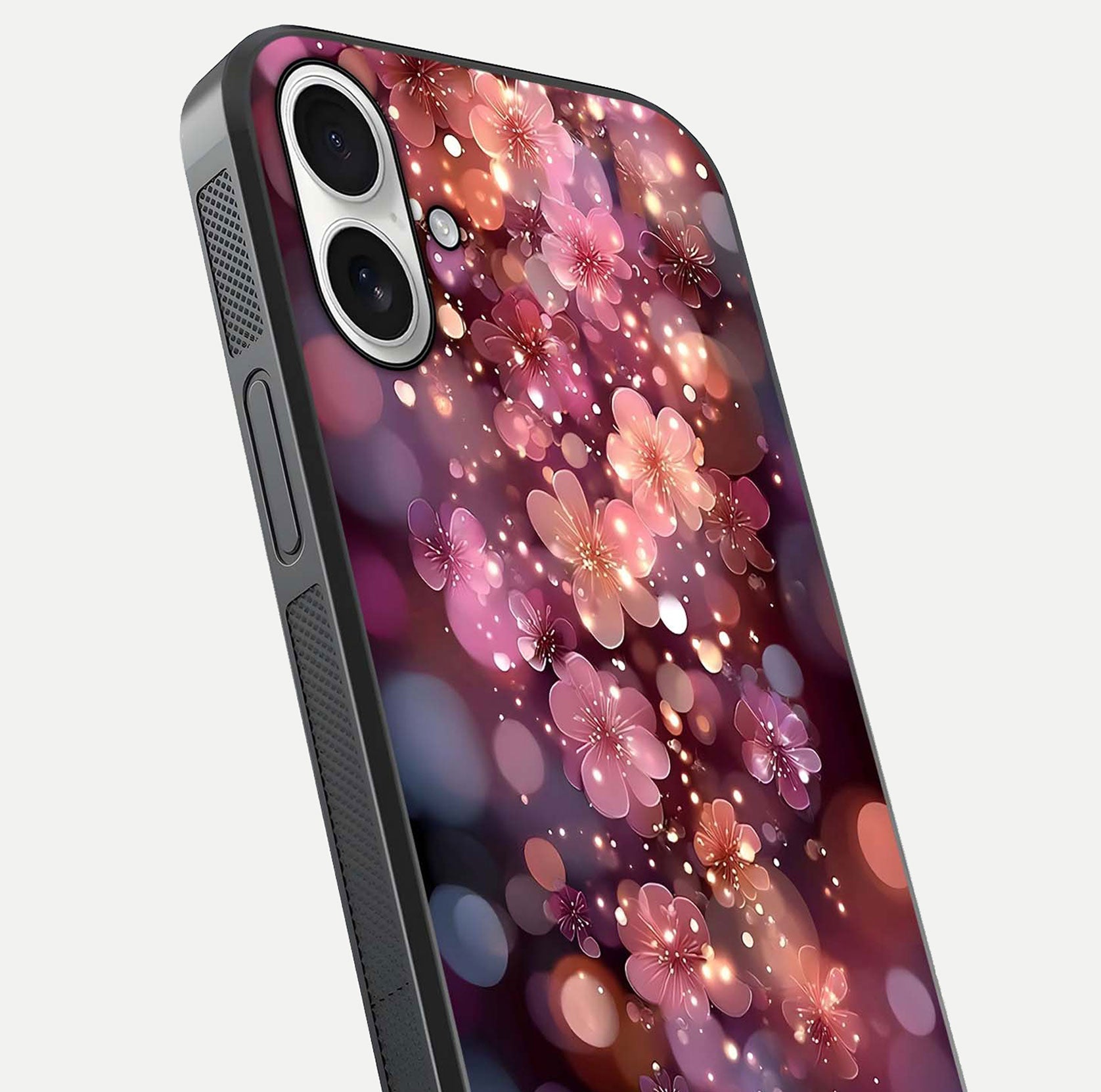 Glowing Petal Bliss Glass Case for iPhone 17 close-up angled shot showing petal glow, color depth, and reflection shine