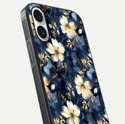 Golden Midnight Bloom Glass Case for iPhone 17 close-up angled shot showing floral detail and reflection shine