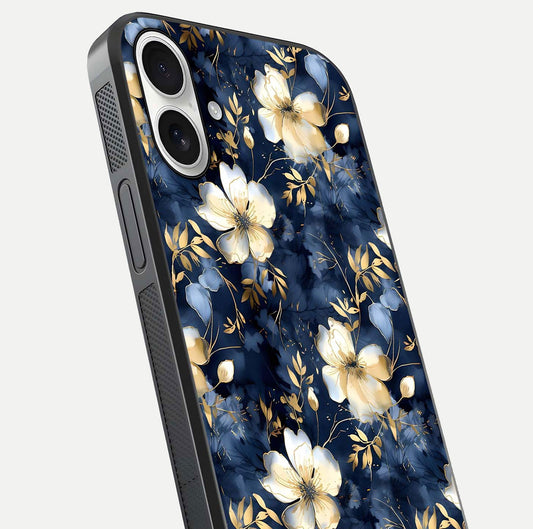 Golden Midnight Bloom Glass Case for iPhone 17 close-up angled shot showing floral detail and reflection shine