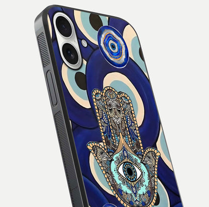 Hamsa Divine Guard Glass Case for iPhone 17 close-up angled shot showing detailed palm motif and reflection glow