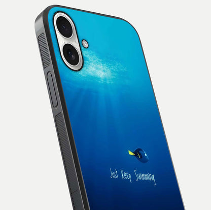 Just Keep Swimming Glass Case for iPhone 17 close-up angled shot showing elegant lettering and blue tone reflection