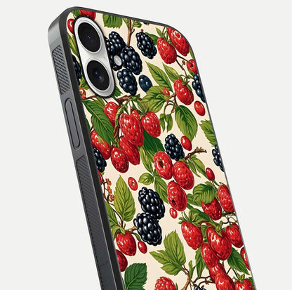 Mixed Berry Collage Glass Case for iPhone 17 close-up angled shot showing fruit detail and reflection glow