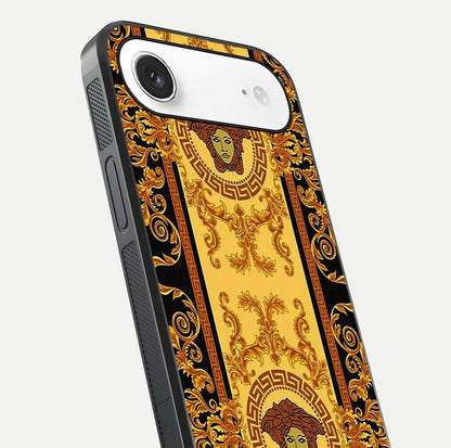 Golden Royal Heritage Glass Case for iPhone Air  close-up angled shot showing intricate design and metallic reflection