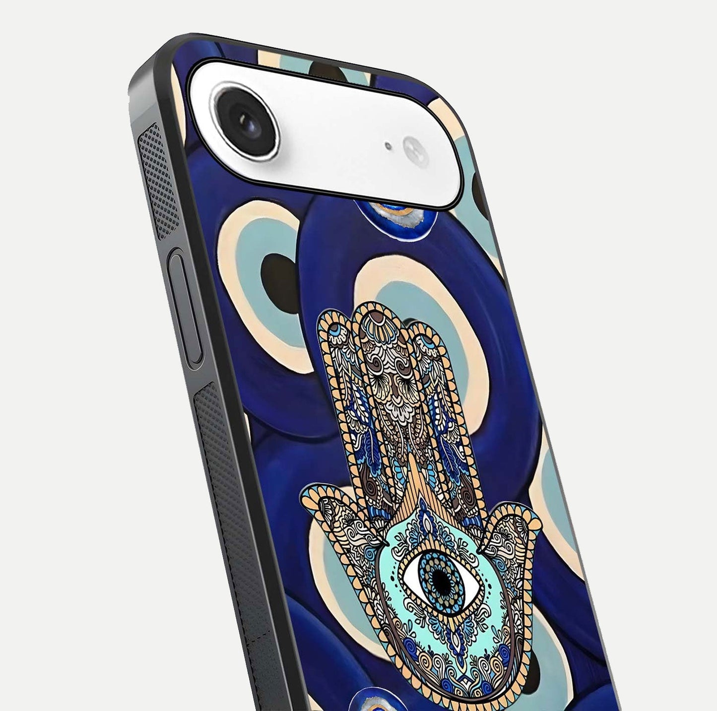 Hamsa Divine Guard Glass Case for iPhone Air  close-up angled shot showing detailed palm motif and reflection glow