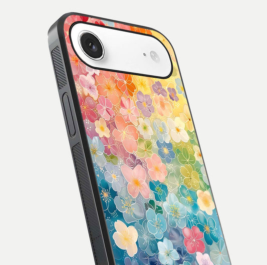 Rainbow Blossom Burst Glass Case for iPhone Air  close-up angled shot showing petal colors and reflection