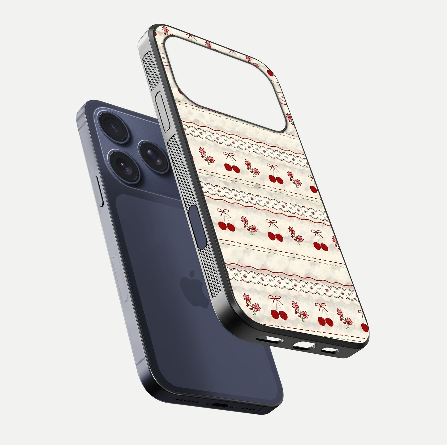 Cherry Bloom Charm Glass Case for iPhone 17 Pro floating mockup showing bloom texture and polished gloss