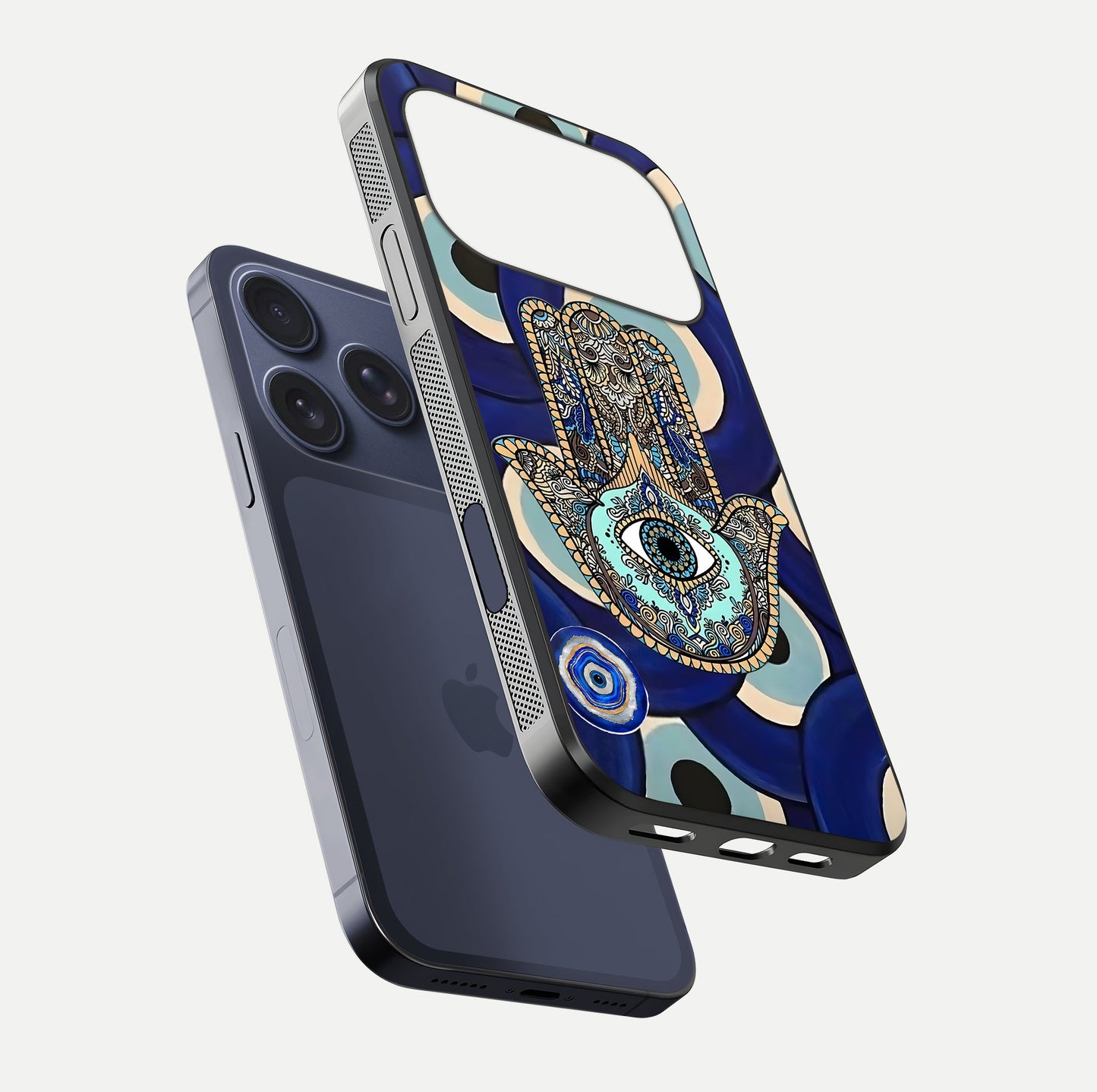 Hamsa Divine Guard Glass Case for iPhone 17 Pro floating dual-view mockup showing gloss shine and mystical pattern