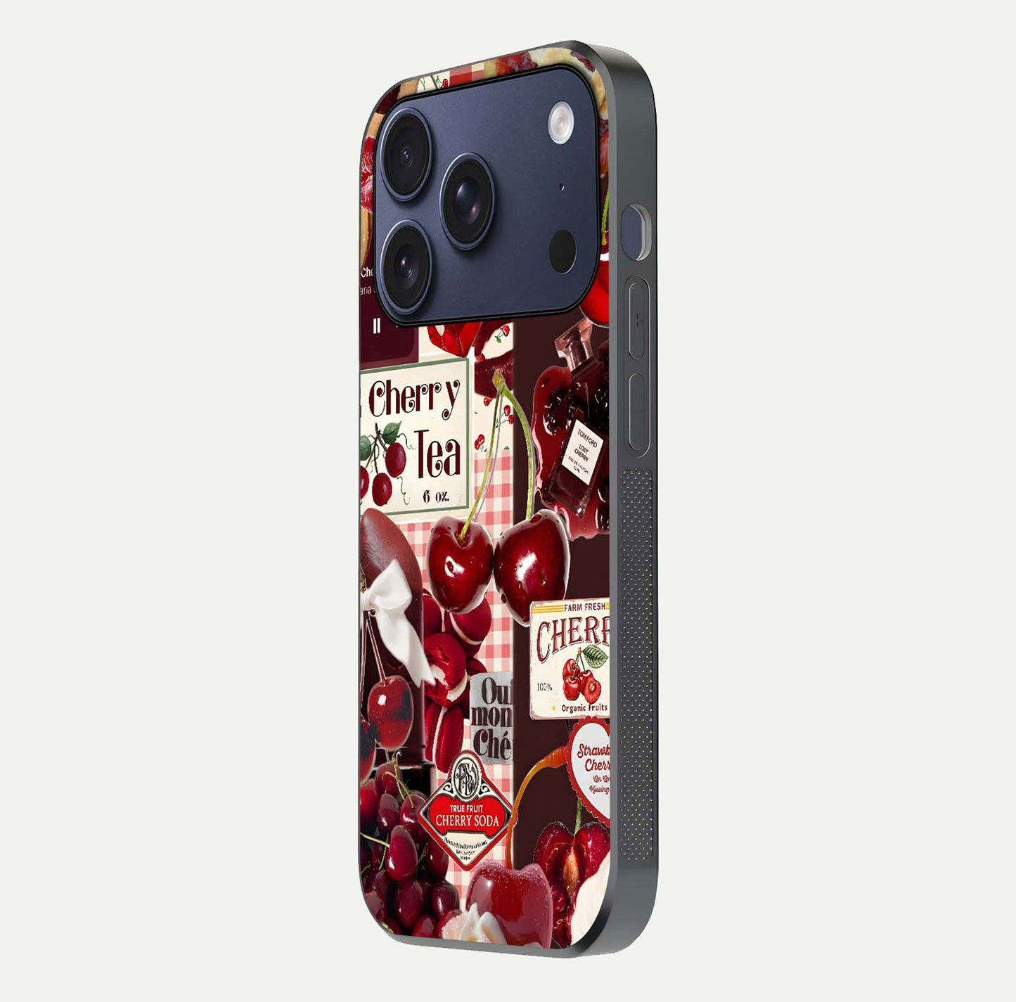 Aesthetic Cherry Tea Glass Case for iPhone 16 Pro side-angle image showing cherry collage print, camera module, and glossy finish reflection