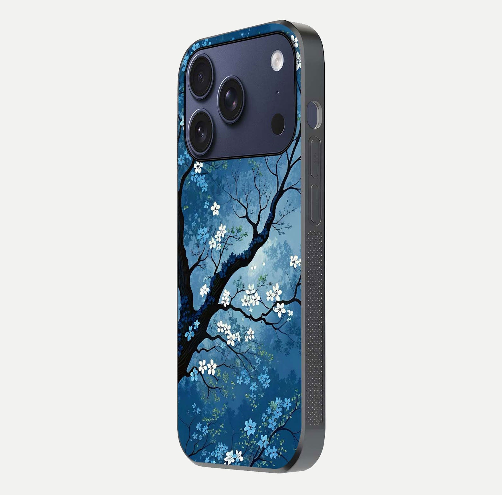 Blue Tree Serenity Glass Case for iPhone 17 Pro side-angle shot showing glossy edge and tree pattern reflection
