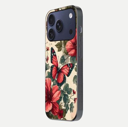 Crimson Butterfly Garden Glass Case for iPhone 17 Pro side-angle photo capturing gloss texture and soft tone