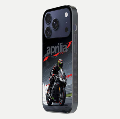 Dark Aprilla Glass Case for iPhone 17 Pro side-angle photo showing reflection gloss and curved edge finish