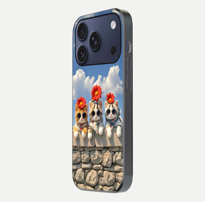 Floral Kitty Squad Glass Case for iPhone 17 Pro side-angle photo showing reflection glow and polished surface