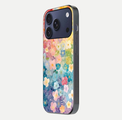 Rainbow Blossom Burst Glass Case for iPhone 17 Pro side-angle image showing reflection and floral burst detail
