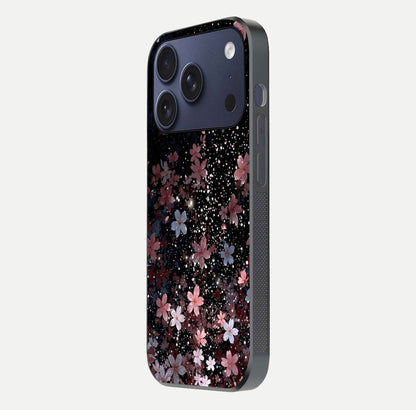 Starlit Flower Dreams Glass Case for iPhone 17 Pro side-angle image showing shine, edge detail, and floral contrast