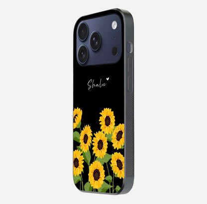 Sunflower Chic Mood Custom Name Glass Case for iPhone 17 Pro side-angle image showing reflection and yellow floral tone