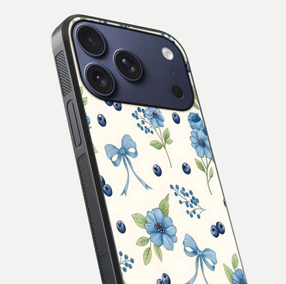 Blue Flower & Bow Glass Case for iPhone 17 Pro close-up shot highlighting ribbon detail and flower gloss finish