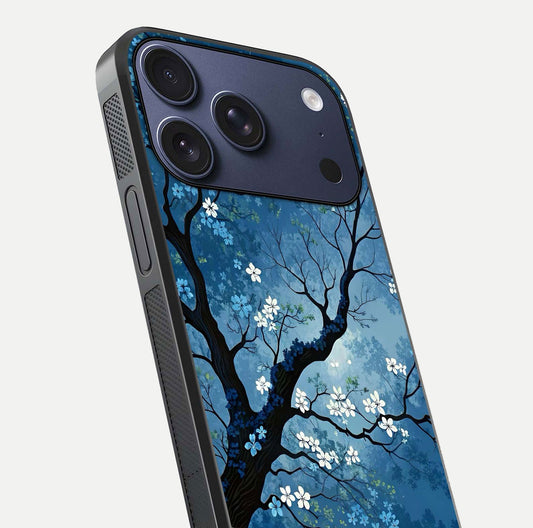 Blue Tree Serenity Glass Case for iPhone 17 Pro close-up view highlighting tree branches and reflection gloss