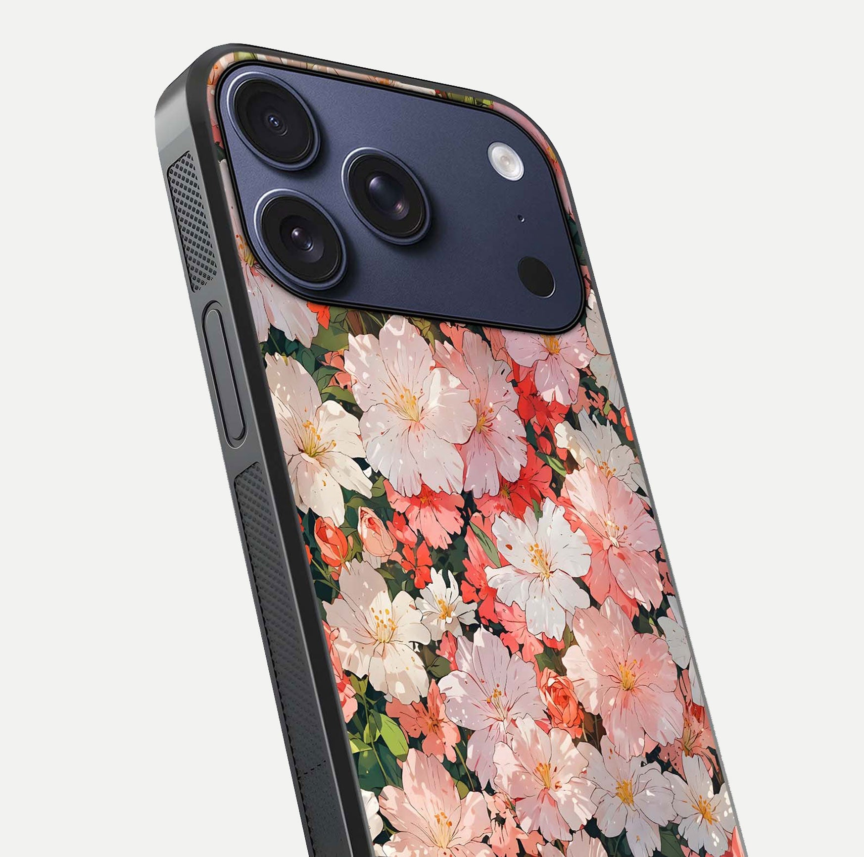 Blush Bloom Field Glass Case for iPhone 16 Pro close-up shot capturing pastel flower field tones and gloss shine