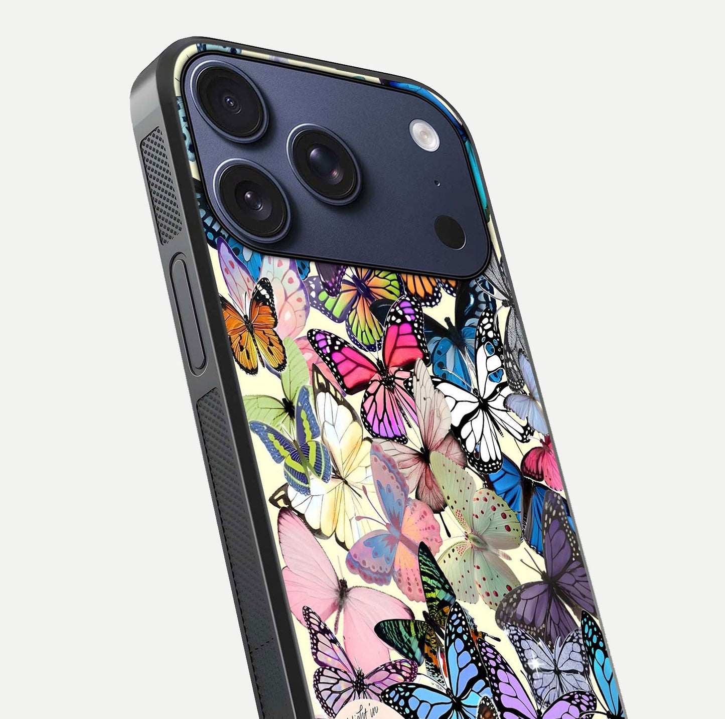 Butterflies Petal Dream Glass Case for iPhone 17 Pro close-up highlighting butterfly wings and pink petal gloss