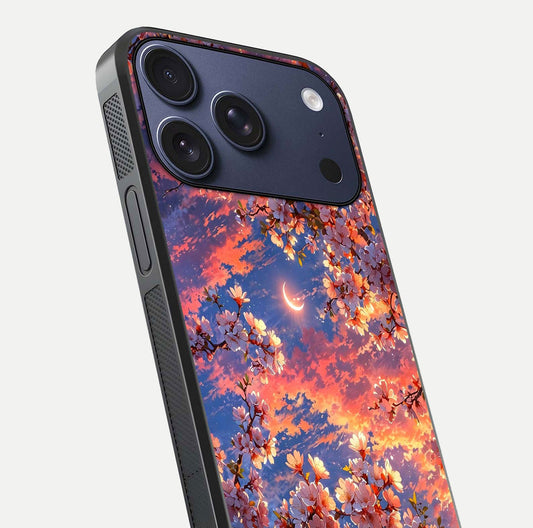 Celestial Sakura Sunset Glass Case for iPhone 17 Pro close-up image highlighting blossom petals and gloss shine