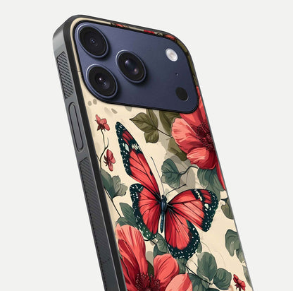 Crimson Butterfly Garden Glass Case for iPhone 17 Pro close-up showing wing detail and reflection shine