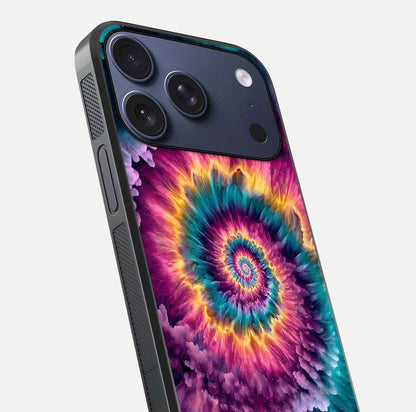 Galactic Spiral Burst Glass Case for iPhone 17 Pro close-up angled shot showing spiral burst detail, neon tones, and glossy reflection