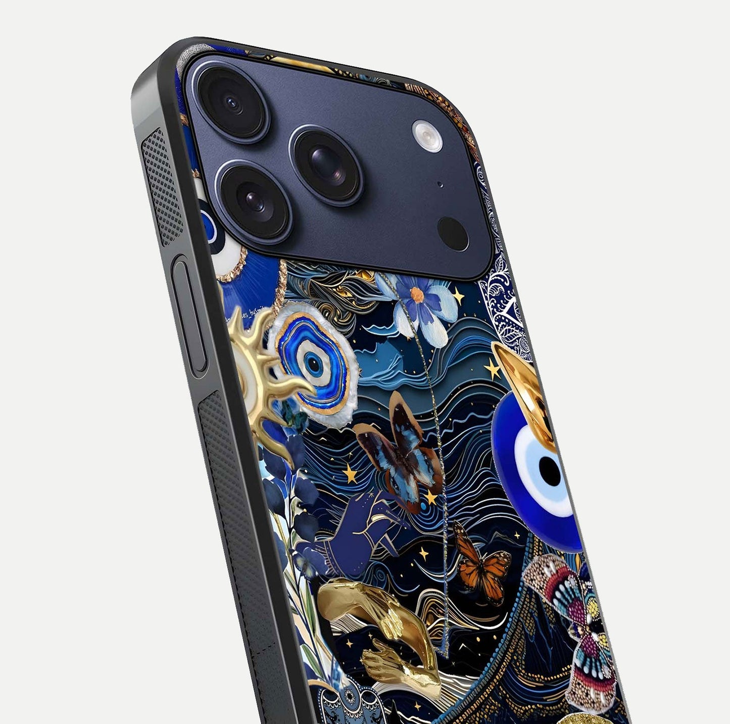 Golden Moon Magic Glass Case for iPhone 17 Pro close-up angled shot showing lunar glow, star detail, and reflection brightness