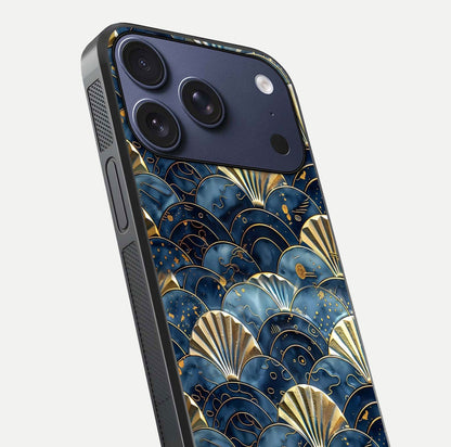 Golden Wave Luxe Glass Case for iPhone 17 Pro close-up angled shot showing flowing wave texture and reflection brightness