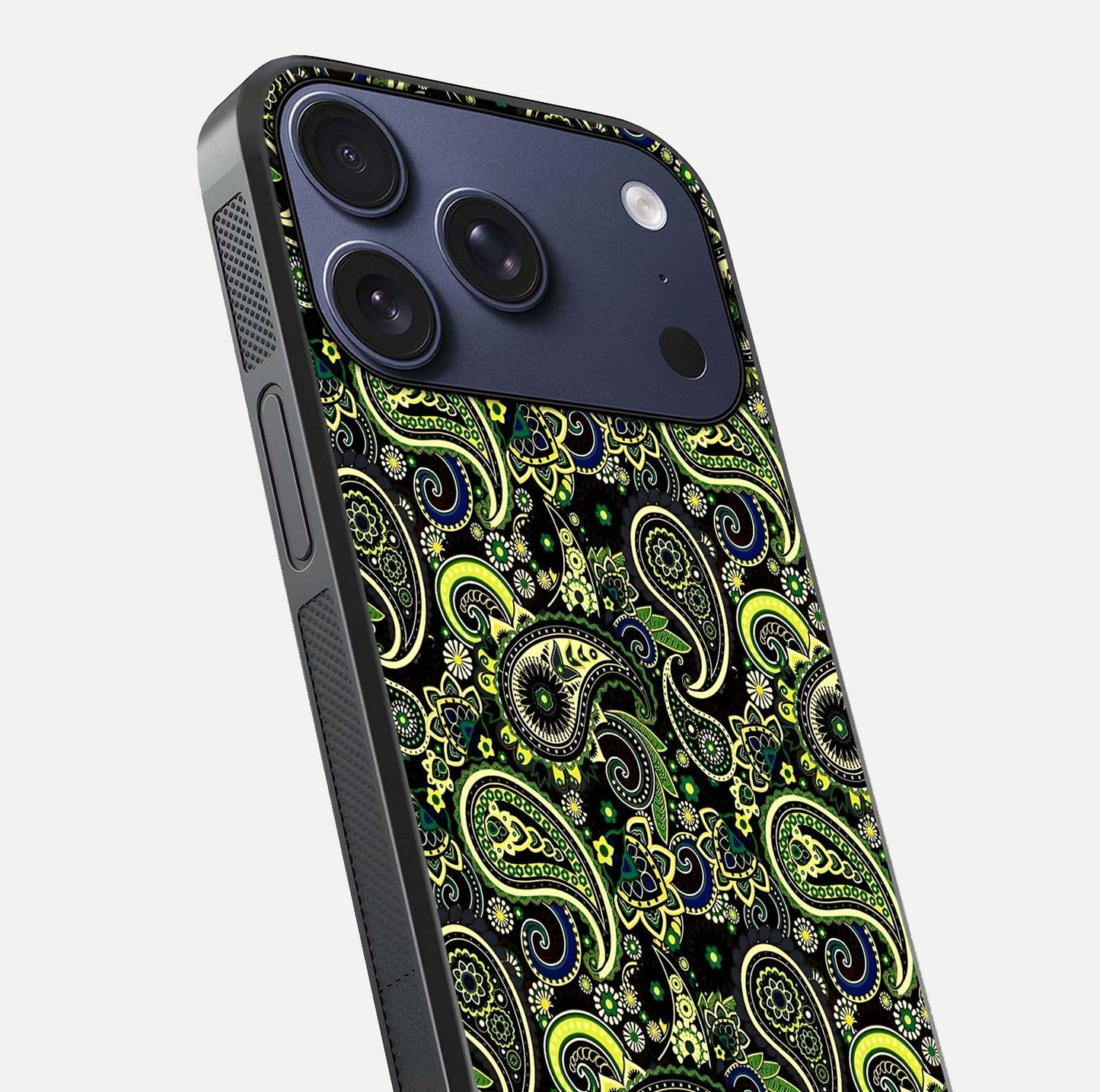 Green Mandala Pattern Glass Case for iPhone 17 Pro close-up angled shot showing fine detailing and gold-green reflection