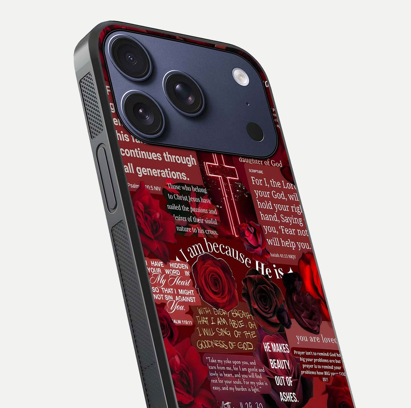 Jesus Love Heals Glass Case for iPhone 17 Pro close-up angled shot showing healing text, cross detailing, and reflection