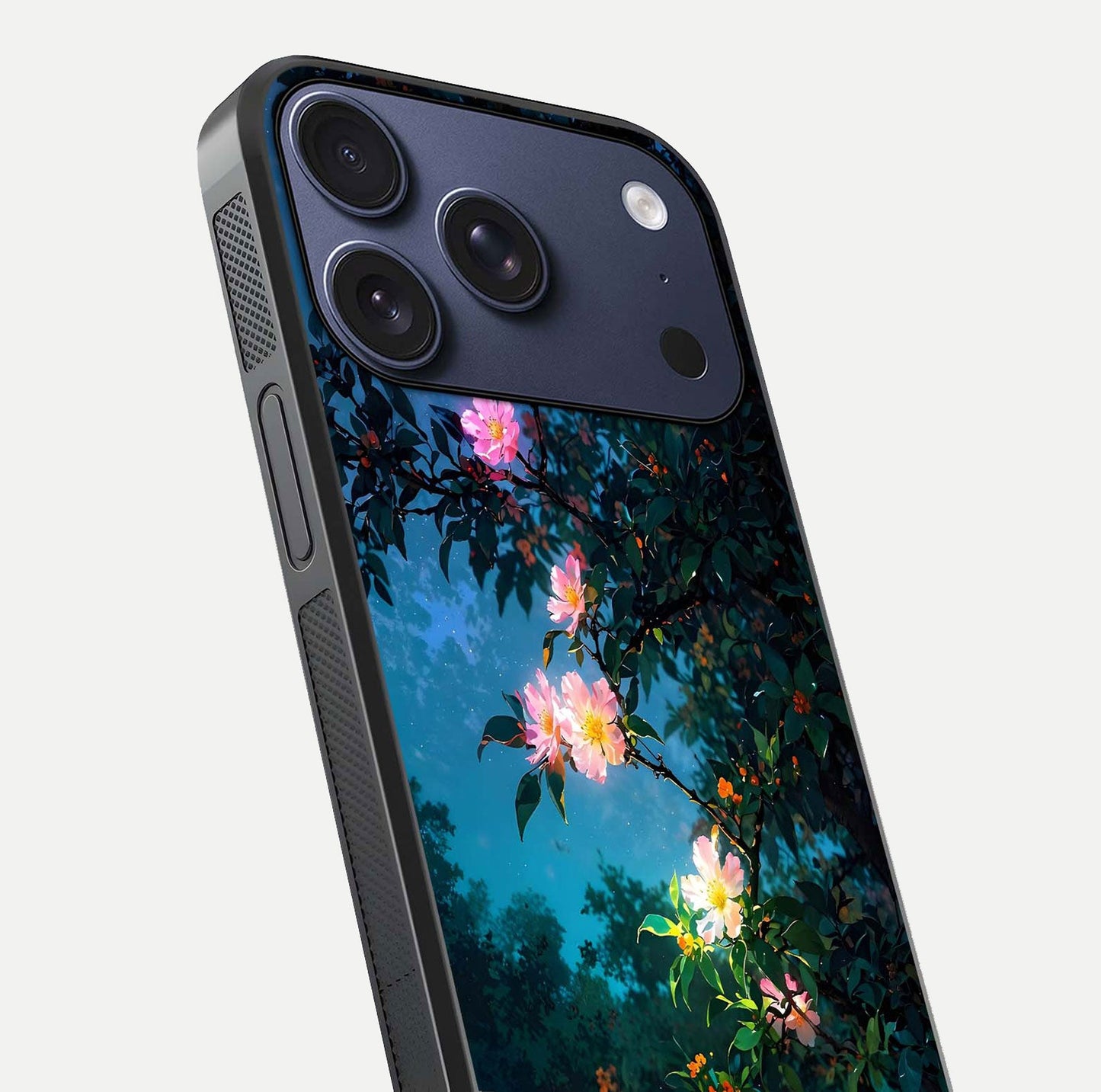 Midnight Bloom Glow Glass Case for iPhone 17 Pro close-up angled shot showing petal highlights and glow reflection