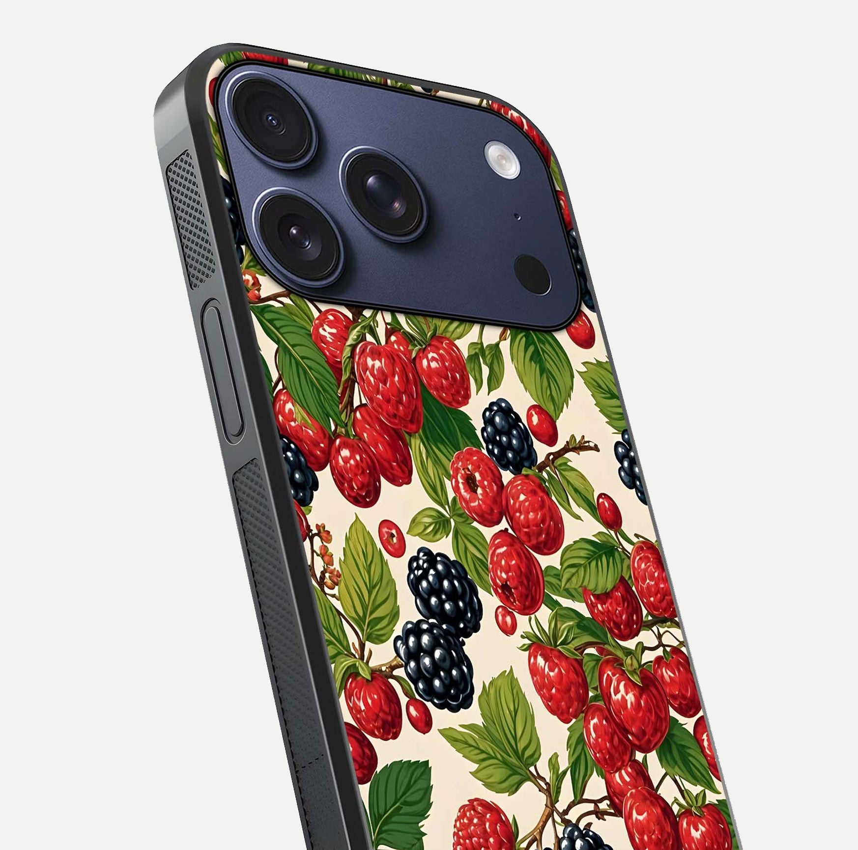 Mixed Berry Collage Glass Case for iPhone 17 Pro close-up angled shot showing fruit detail and reflection glow