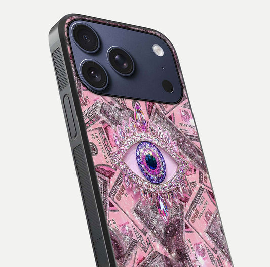 Money Eye Luxe Glass Case for iPhone 17 Pro close-up angled shot showing gold detailing and reflection shine