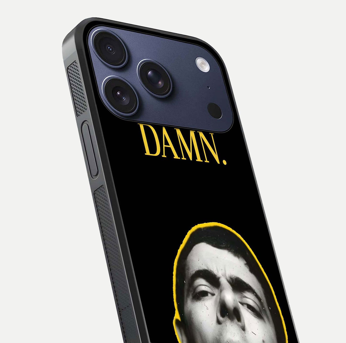 Mr Bean Damn Glass Case for iPhone 17 Pro close-up angled shot highlighting comic expression and shine detail