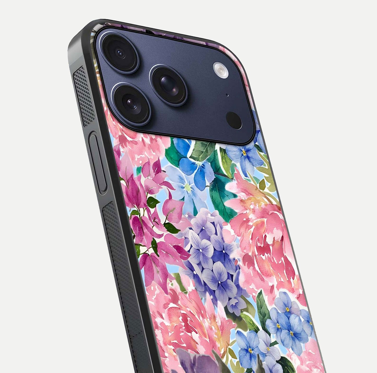 Pastel Floral Mix Glass Case for iPhone 17 Pro close-up angled shot highlighting flower detail and reflection