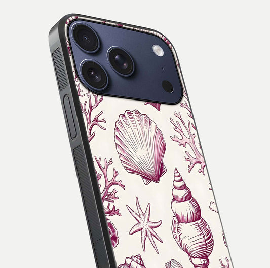 Pink Shells Outline Glass Case for iPhone 17 Pro close-up angled shot showing fine shell lines and reflection