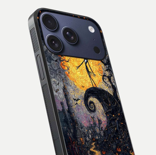 Pumpkin Moon Night Glass Case for iPhone 17 Pro close-up angled shot showing moon reflection and Halloween glow