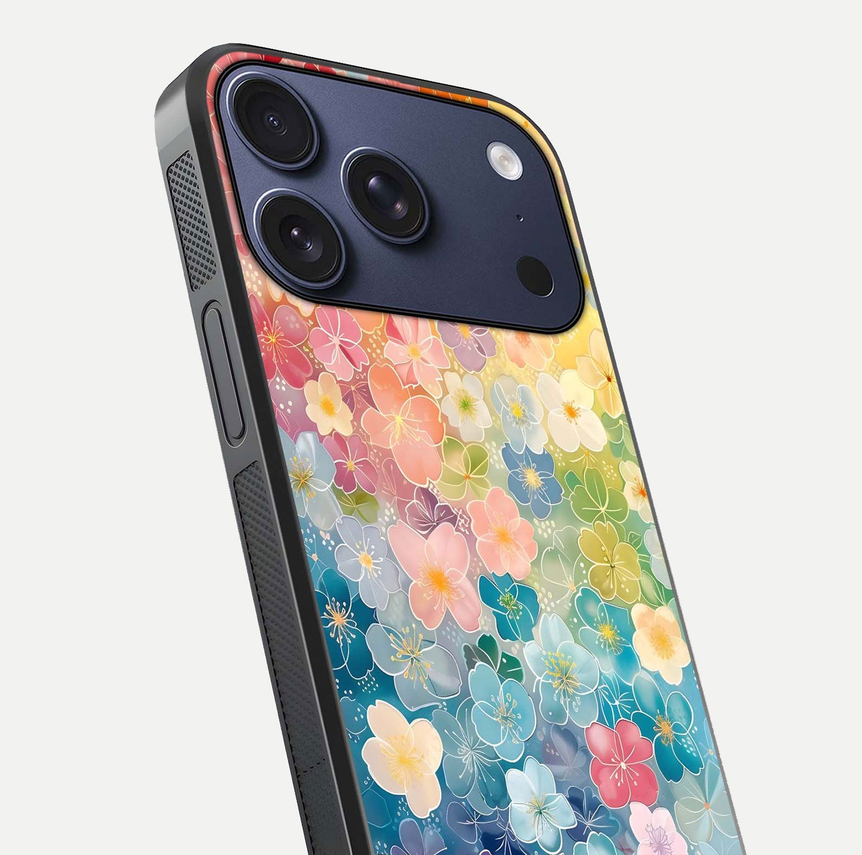 Rainbow Blossom Burst Glass Case for iPhone 17 Pro close-up angled shot showing petal colors and reflection