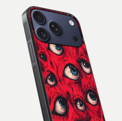 Red Eyes Pattern Glass Case for iPhone 17 Pro close-up angled shot highlighting vivid contrast and HD shine